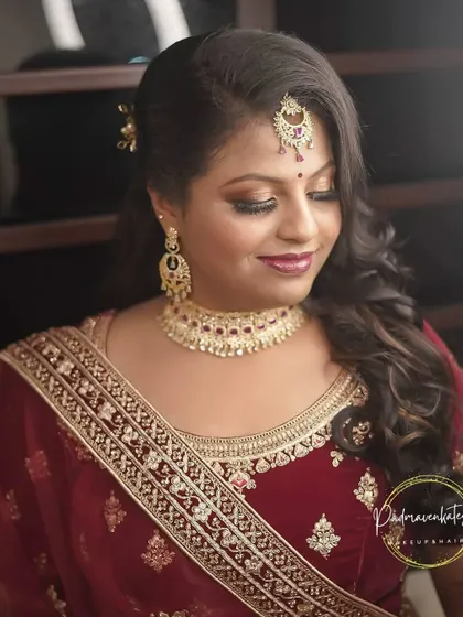 A close-up of the reception makeup. I focused on creating a flawless, radiant complexion with soft, blended eyeshadow and a complementary lip color for an elegant and polished look.