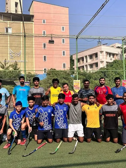 A group photo of our players after a Sunday session. The mix of jerseys and ages represents the diverse and inclusive community we have built.