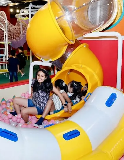 Kids love our tube slide that winds its way down into the colorful ball pit.