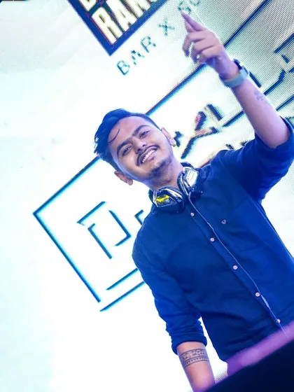 A shot of me pointing to the crowd, feeling the energy at Boomrang Bar. My goal is always to connect with the audience and make them feel like they are part of the performance.