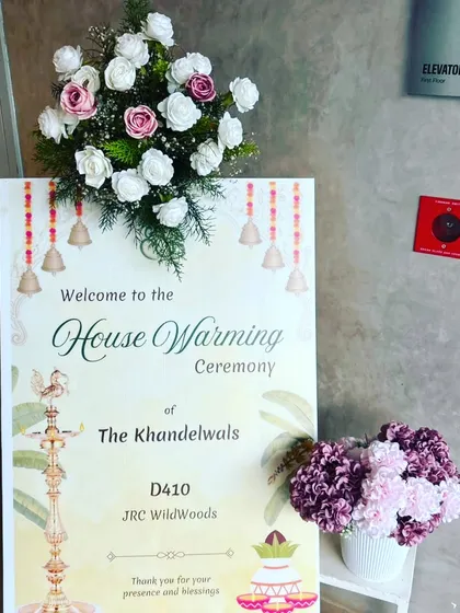 A personalized welcome for a new beginning! This custom housewarming ceremony sign for the Khandelwals, complete with traditional motifs like a diya and kalash, was the first greeting for their loved ones.