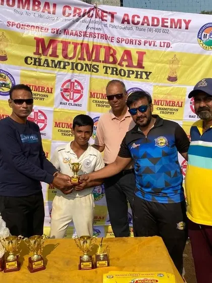 Dinesh Besra recognized as the 'Emerging Player' at the Mumbai Champions Trophy.