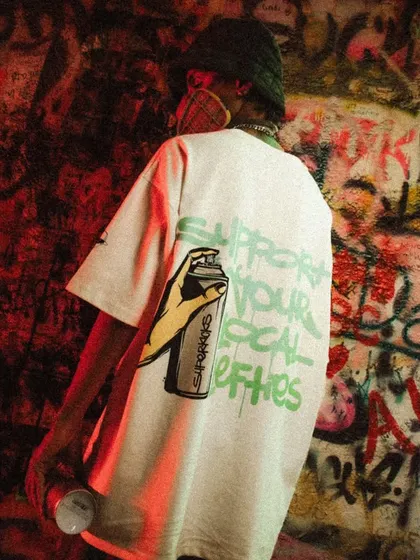 A shot from a collaboration with Superkicks and Lefthander. This photo, taken against a heavily tagged wall, captures the authentic street culture that my art comes from.