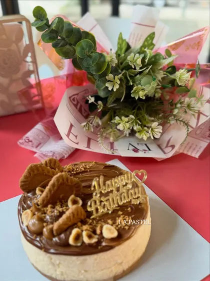 Another shot of my popular Nutella and Biscoff topped cheesecake, paired with a lovely bouquet for the perfect birthday gift.