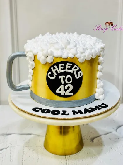Another round of my popular beer mug cake. This one was made for a "Cool Mamu" turning 42, showing that this fun design is a hit for any celebration.