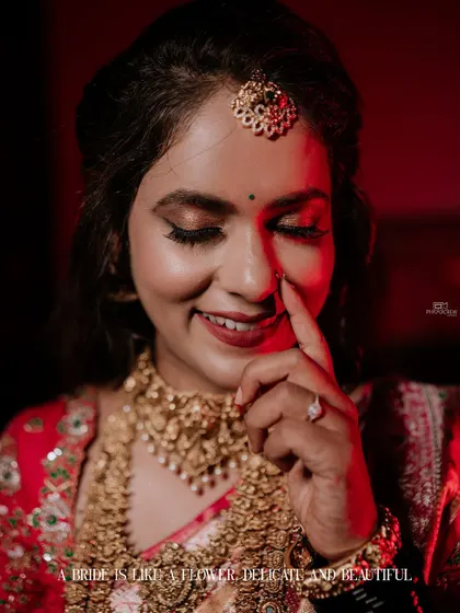 A candid, smiling close-up of the bride, capturing her natural joy.