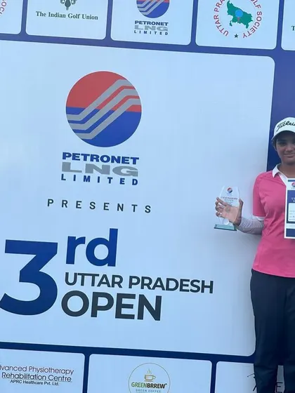 A Student Holding Her Winner's Trophies: Another shot of our champion, Shreshtha Shukla, celebrating her victory at the 3rd UP Open. We are incredibly proud of her outstanding performance and hard-earned success.