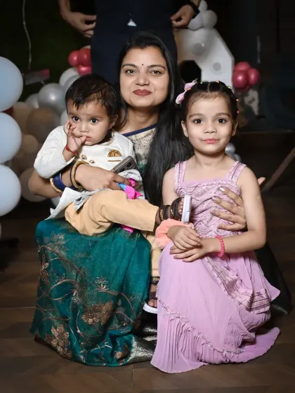 A mother poses with her two children. I am comfortable working with kids of different ages in the same session.