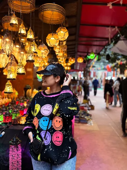 A candid moment while exploring the market, a place full of inspiration.