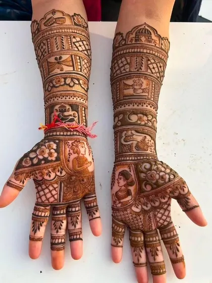 This design features portraits on the palms and bands of various wedding symbols on the arms, including a dragonfly for a unique touch.