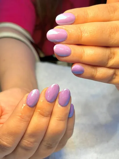 A different angle of the lilac aura nails, showing how the light catches the soft gradient of colors.