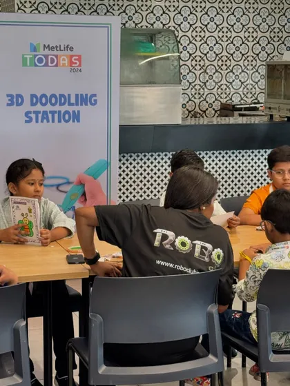 Our mentor assists a group of children at the 3D Doodling Station during the MetLife TODAS 2024 event. This activity is always a huge hit, allowing kids to draw in three dimensions and bring their art to life.