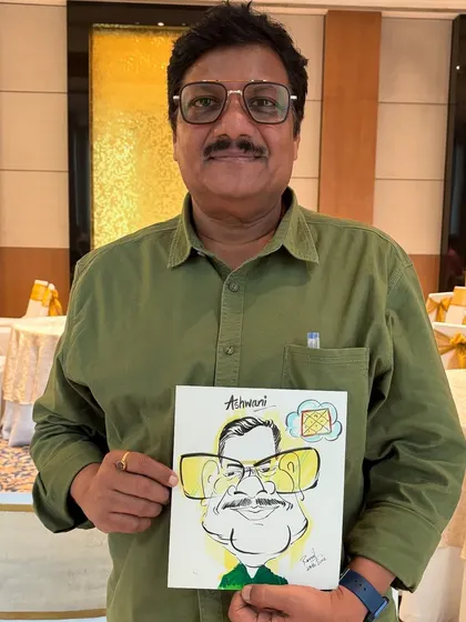 This guest's caricature features fun, oversized glasses, a signature touch in my artwork.