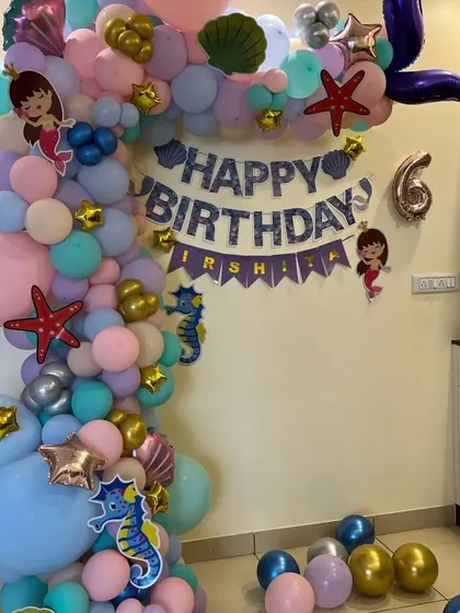 Another angle of the detailed mermaid balloon arch.