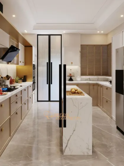 An open and airy kitchen with a marble island, light wood cabinets, and brass accents. The layout is designed for easy movement and social interaction.