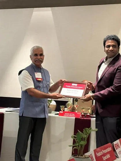 A formal photograph from the BNI recognition event.