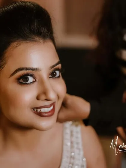 A beautiful close-up of Ashwini, her eyes sparkling with happiness.
