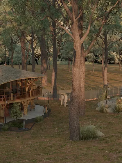 From this angle, the relationship between the main building and the surrounding forest is clear. The structure's curved roofline and wooden supports echo the forms of the trees, making it feel as if it grew from the earth itself.