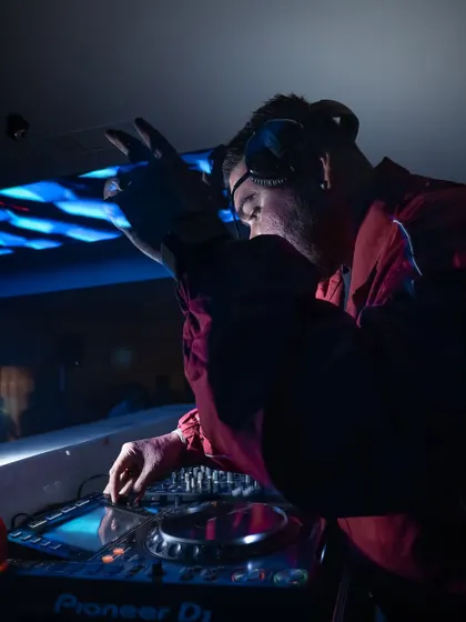 A close-up shot of me working the controls during my 10-year anniversary set. The gear is an extension of my creativity.
