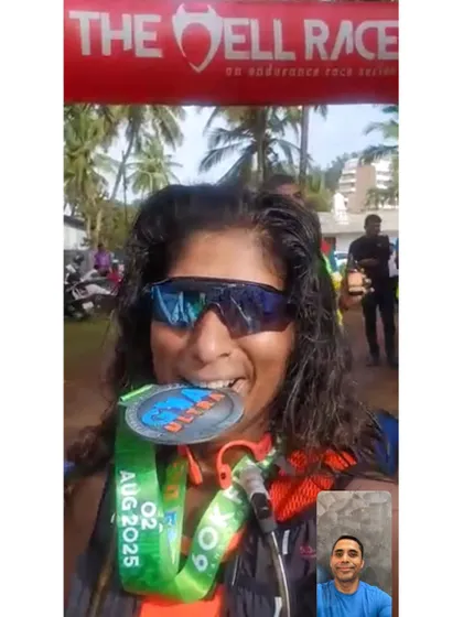 I love seeing the results of our hard work. Here I am on a video call with a team member proudly biting her finisher medal after completing a grueling 60k ultra race in Goa.