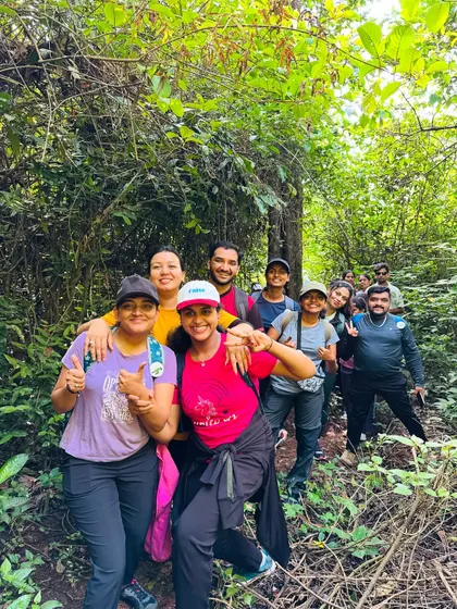 A happy, energetic group making their way through the dense forest trails of Kodachadri.