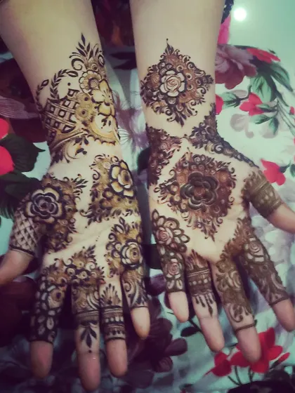A beautiful example of a mixed floral design, combining different types of flowers and leaves.