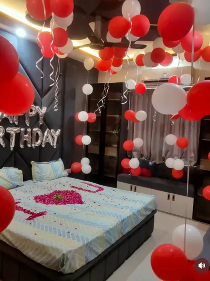 A full view of the sophisticated red and white romantic room decoration.