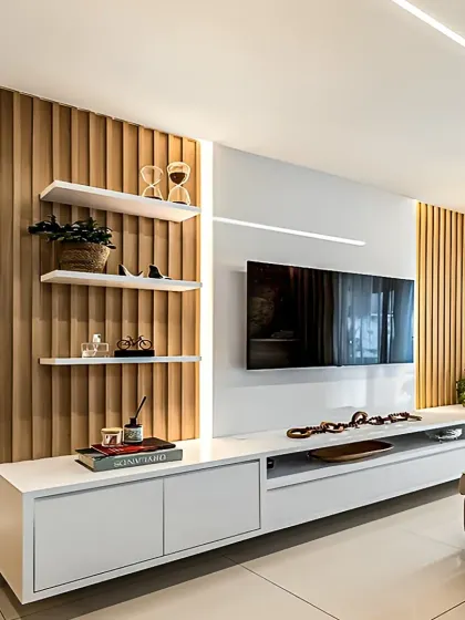 A sleek, contemporary TV unit combining white cabinetry with warm wood fluted panels and integrated LED lighting. This design offers ample storage and a clean aesthetic, making it a stylish centerpiece for any modern living room.