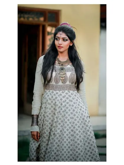 A model showcasing the artistic and bohemian feel of a layered, block-printed Anarkali gown from one of my collections.