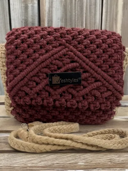 This two-tone bag in maroon and beige is so warm and inviting. The different patterns on the flap and body create a lovely contrast.