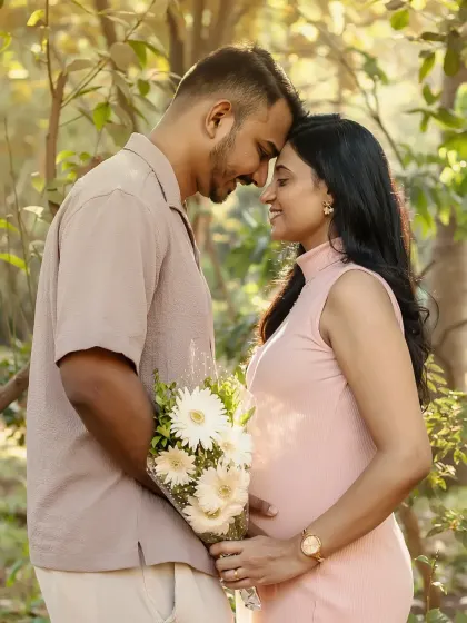 A romantic portrait holding a bouquet of flowers. The connection between you two is so clear in the way you look at each other.