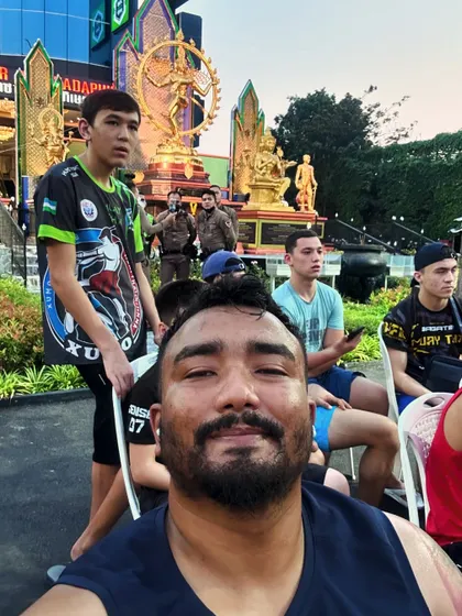 At a Muay Thai event in Thailand. I competed myself to stay sharp and experience the ring again. I may have lost the final, but getting back in there after years was a win for me.