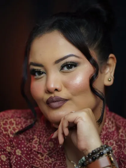This close-up shows the clean lines of the eye makeup and the flawless skin finish. Confidence comes from mastering these small but important details.