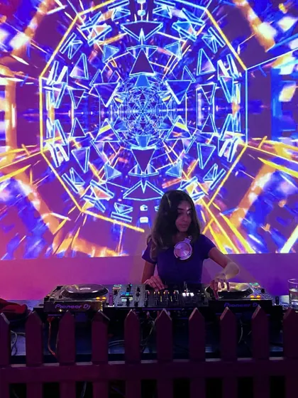 It's all about the vibe. I love playing in venues with unique aesthetics, like this one in Dehradun where the visuals matched the energy of my Bollywood commercial set.