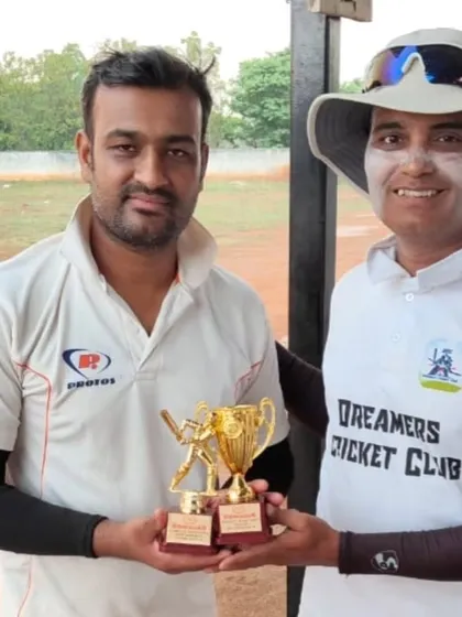 The captain receiving the tournament trophy. These moments of success are a culmination of the entire team's hard work and dedication.