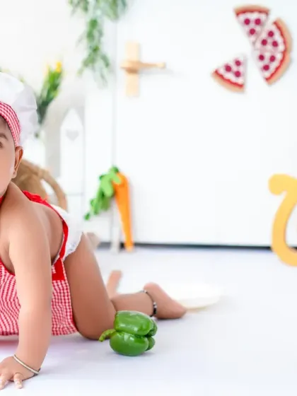 This little chef is on the move! Capturing crawling babies during a themed photoshoot adds a fun and dynamic element to the portraits.