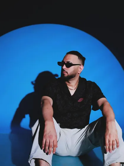 Another look from my press shoot. We played with a lot of cool lighting concepts, like this blue spotlight, to create a moody and modern vibe that matches my sound.