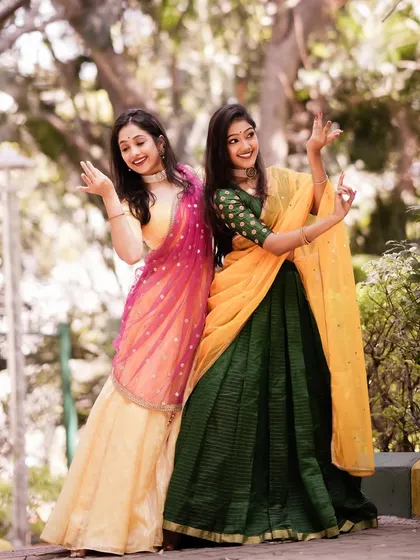 My sister and I, ready for a performance. These photoshoots are a great way for us to capture our partnership and the beautiful costumes that are part of our artistic identity.