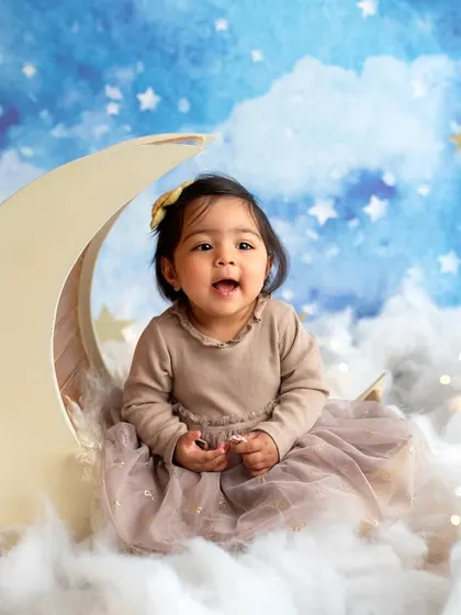 I was over the moon creating this dreamy setup for a sweet sitter session. My studio is filled with props like this to bring your creative ideas to life, making each toddler portrait session a unique adventure.