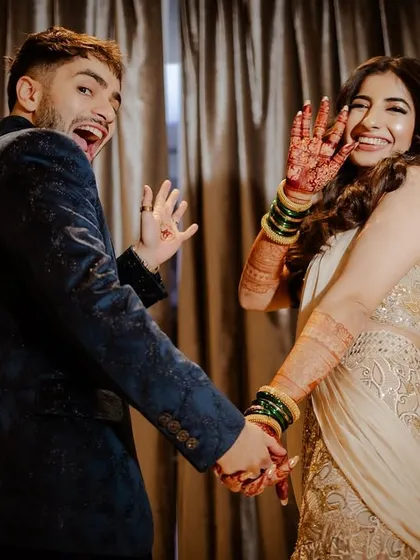 A playful and goofy portrait of the couple, showing their fun side during the after-party.