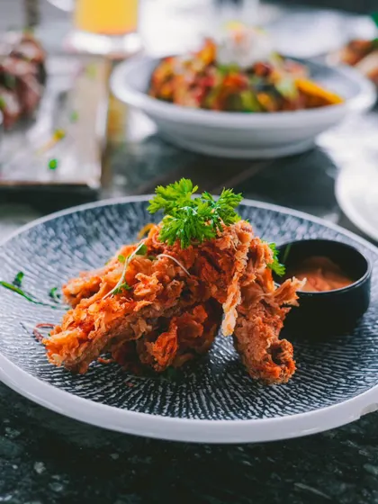 Crispy fried chicken strips served with a creamy dipping sauce. A simple yet satisfying bite.