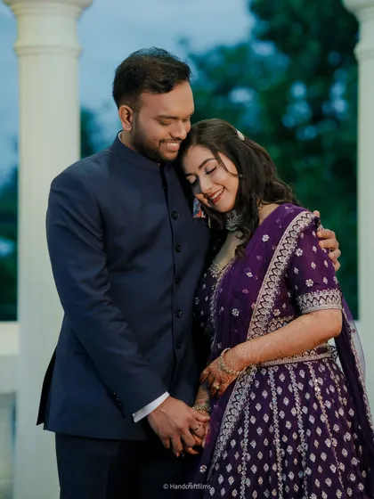 A romantic couple portrait showcasing the bride's evening look. Her makeup was designed to be both glamorous for the party and soft for these intimate photos.