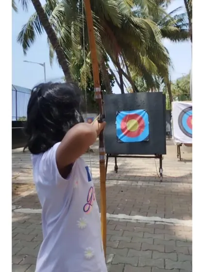 A young girl focuses on her target during our summer camp. It's amazing to see their concentration levels grow with each session.