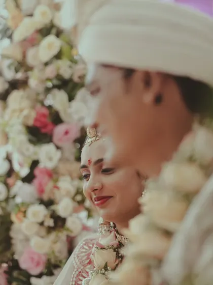 A beautiful, soft-focus shot of the bride looking at her groom during the ceremony.