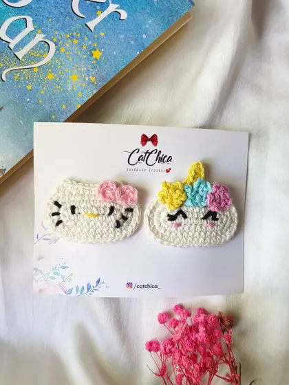 Another look at our popular Hello Kitty and Unicorn crochet clips.