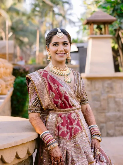 A relaxed and happy portrait of the bride. Her makeup is soft and natural, perfect for an outdoor, daytime wedding.