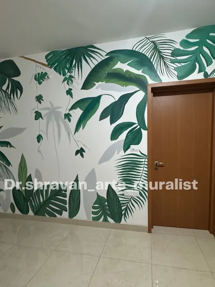 This tropical mural uses a monochrome palette of green and grey tones on a white background. It's a great way to get the jungle vibe in a more subtle, minimalist way.