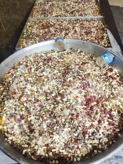 A celebration needs a sweet ending. Here are huge trays of my Shahi Tukda, loaded with nuts and ready to be served. I make sure there is plenty for everyone.