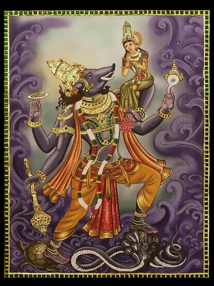 This powerful Tanjore painting depicts Varaha, the boar avatar of Lord Vishnu, with Goddess Lakshmi. The dynamic composition and rich colors symbolize protection, prosperity, and the restoration of cosmic order.