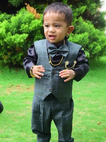 The little gentleman in his custom suit. I love creating dapper outfits for the little boys too.